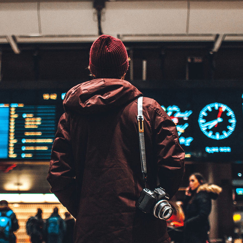 man in airport waiting